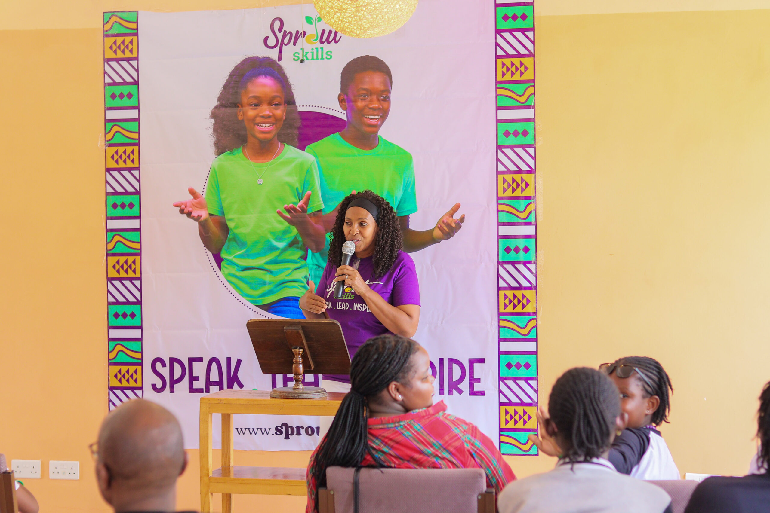 Sprout Life Skills confidence coaching session where a child will confidently speak while supported by a caring instructor and engaged parents