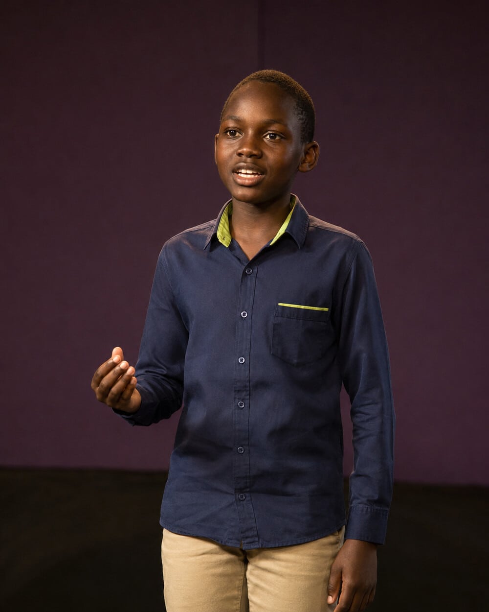 A young speaker mid-speech at the Sprout Speakers Championship
