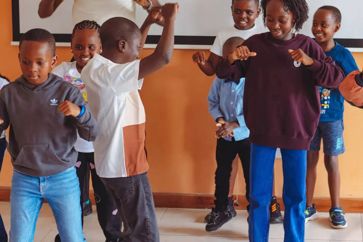 Sprout coach guiding children through a social-skills role-play activity
